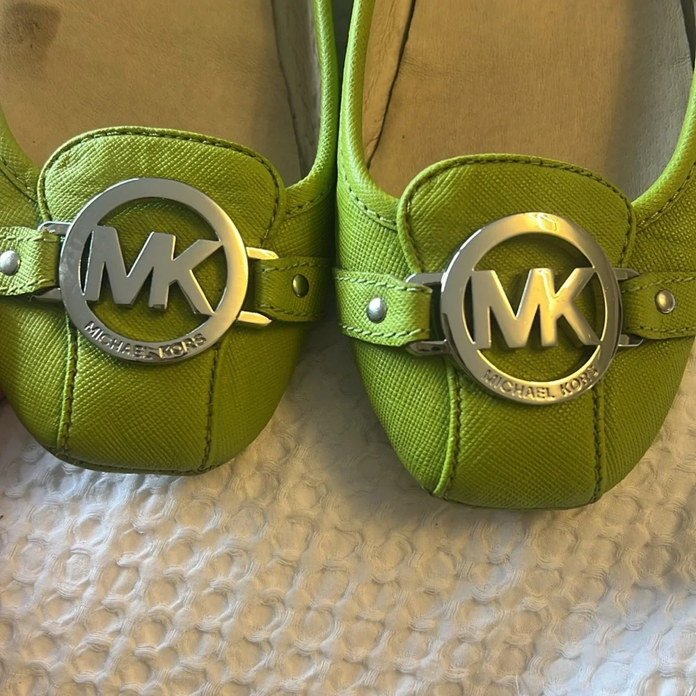Flat Michael Kors shoes.